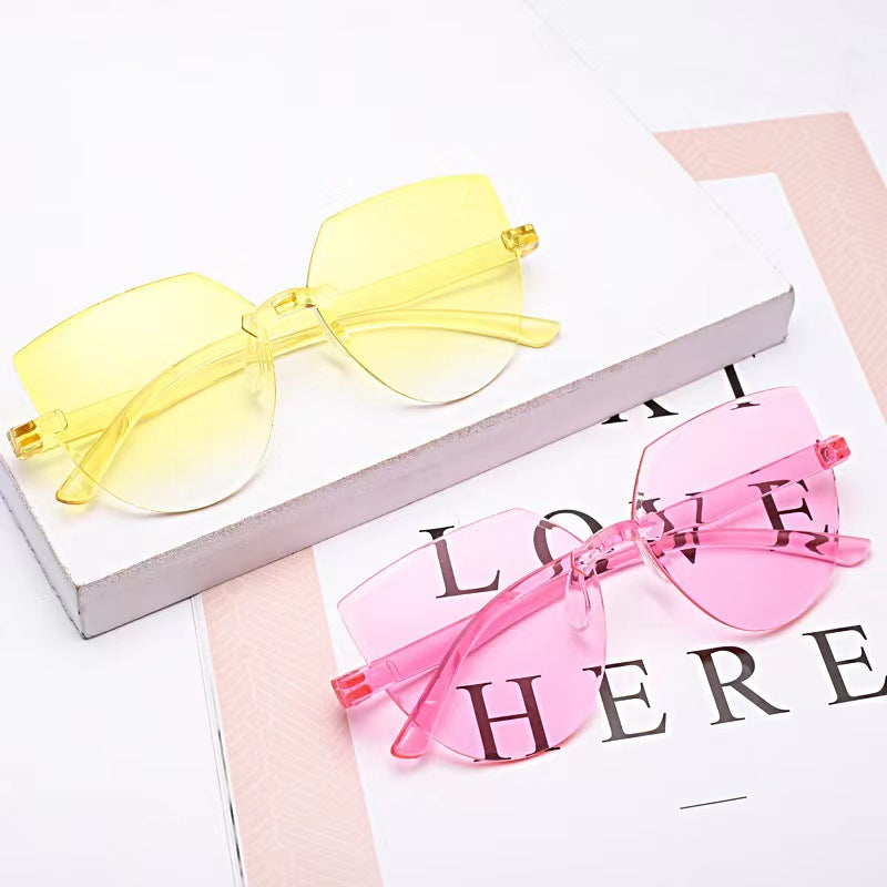 Cross-border Hot Selling Frameless One-piece Jelly Color Transparent Sun Glasses